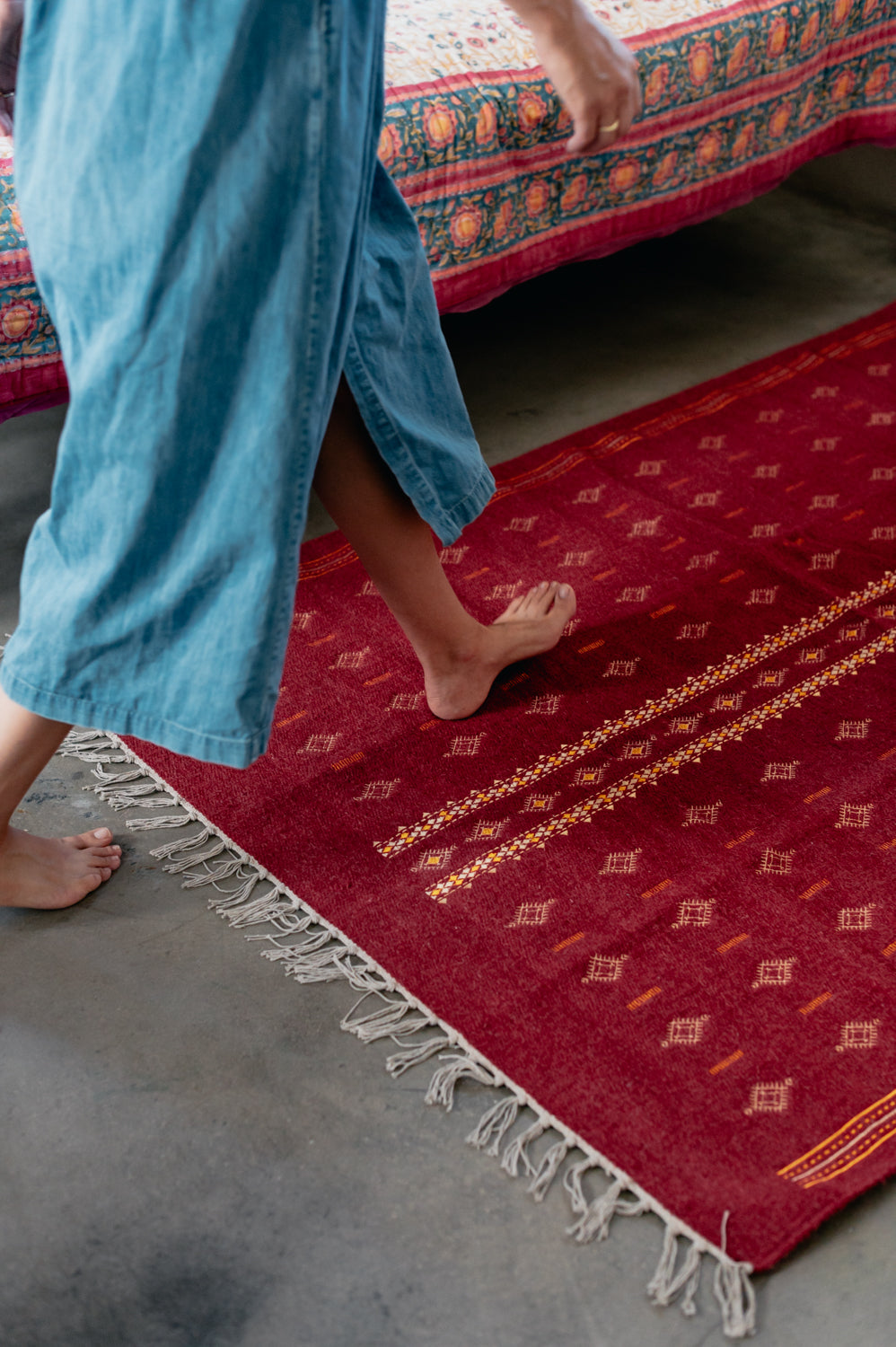 Embroidered red wool carpet