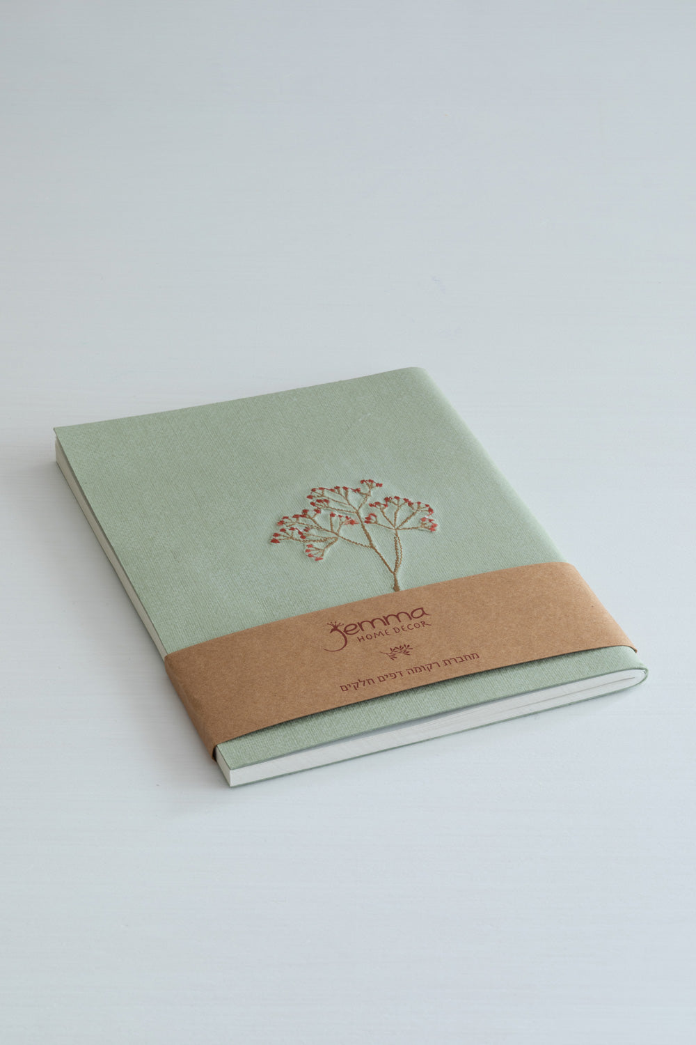 Embroidered notebook with a bud