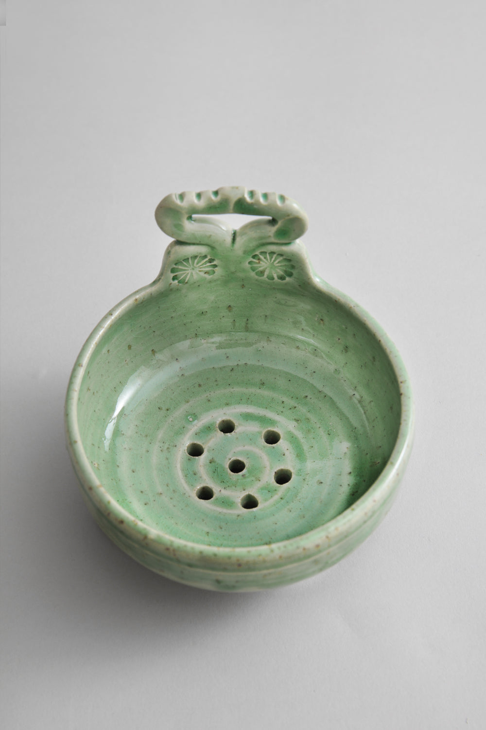 Handmade green ceramic soap dish