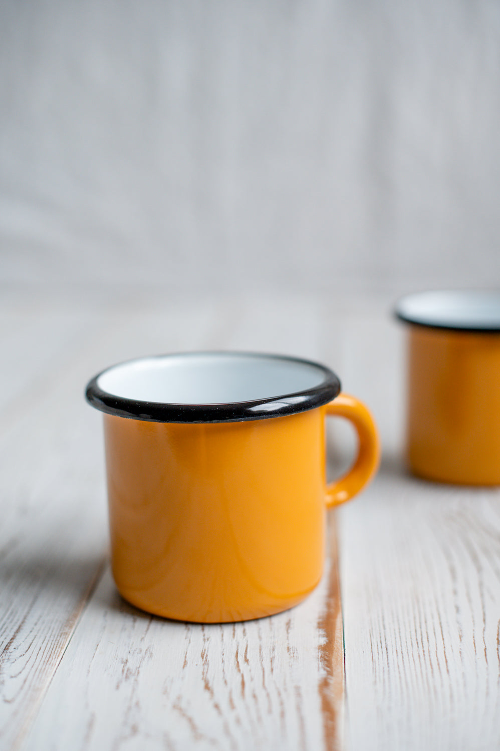 Yellow enamel mug