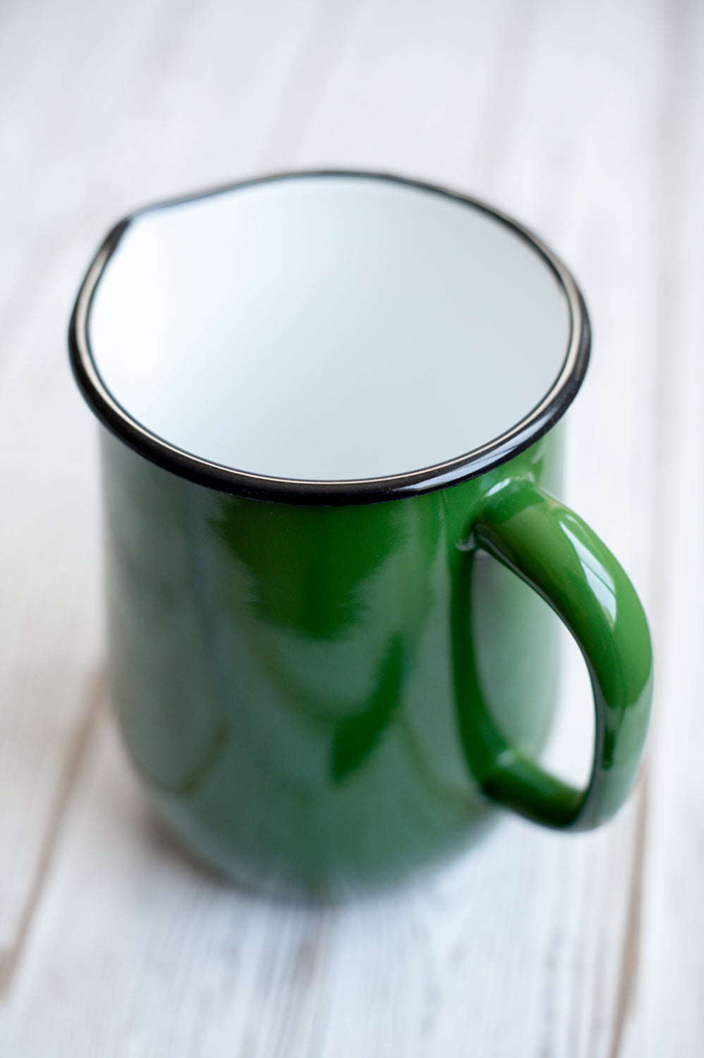Green enamel jug