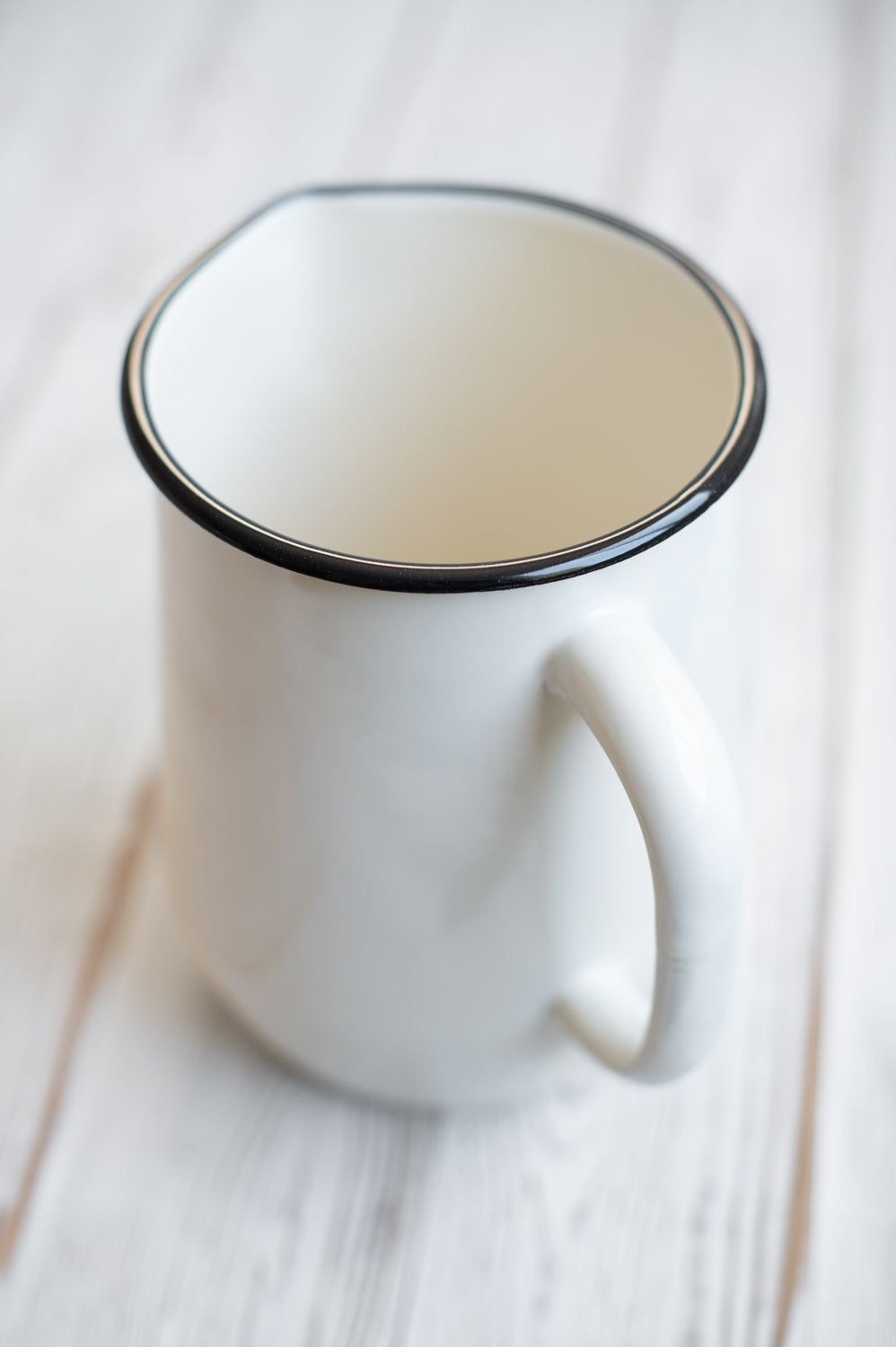 Cream enamel jug