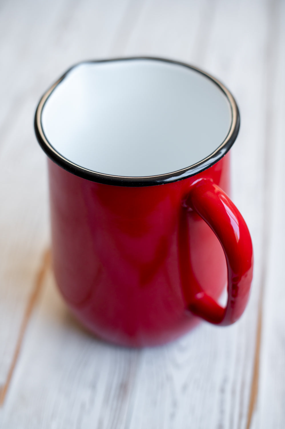 Red enamel jug