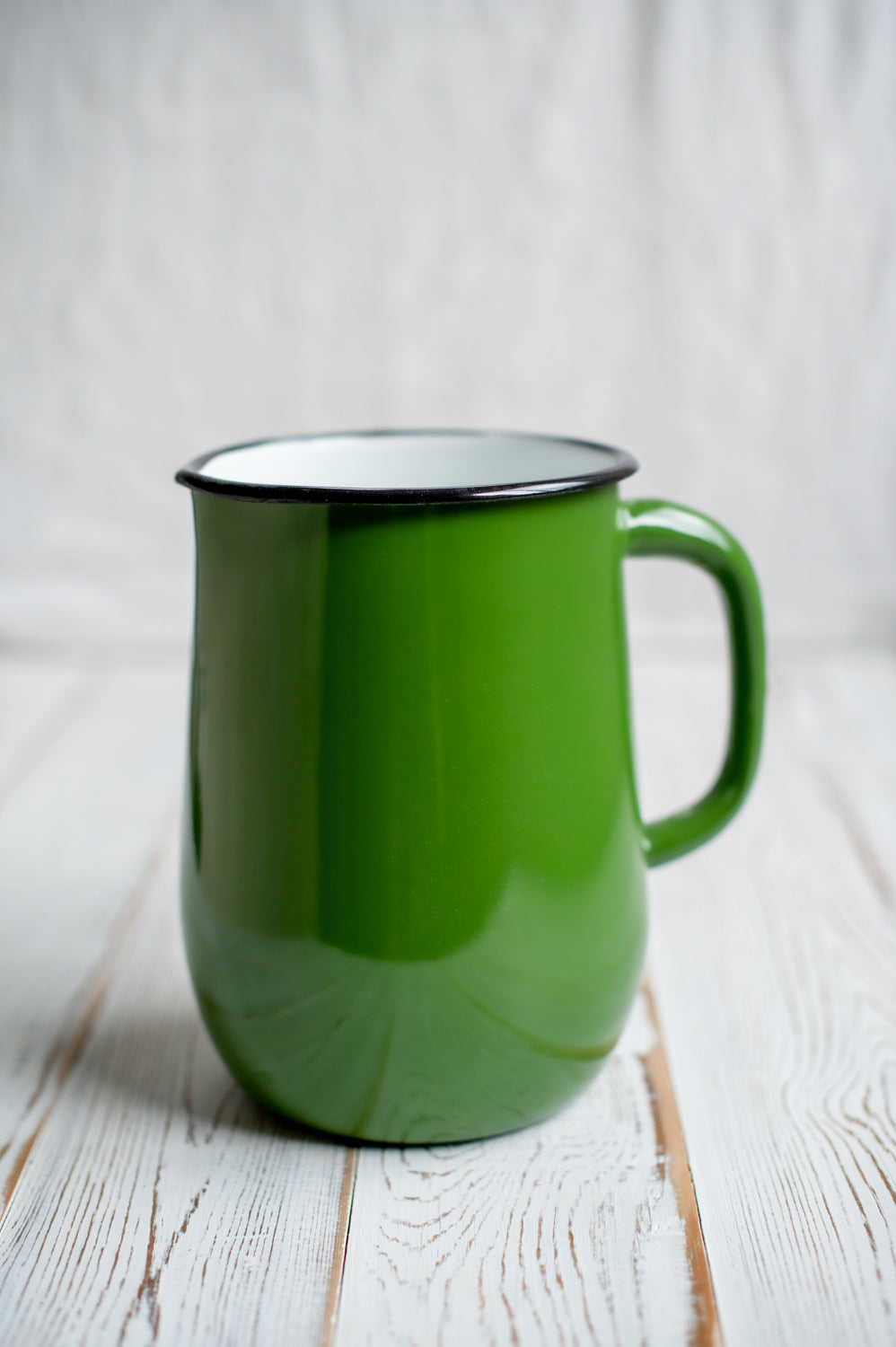 Green enamel jug